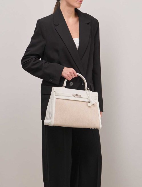 Hermès Kelly 35 Taurillon Clémence / Toile Blanc / Écru on Model | Sell your designer bag