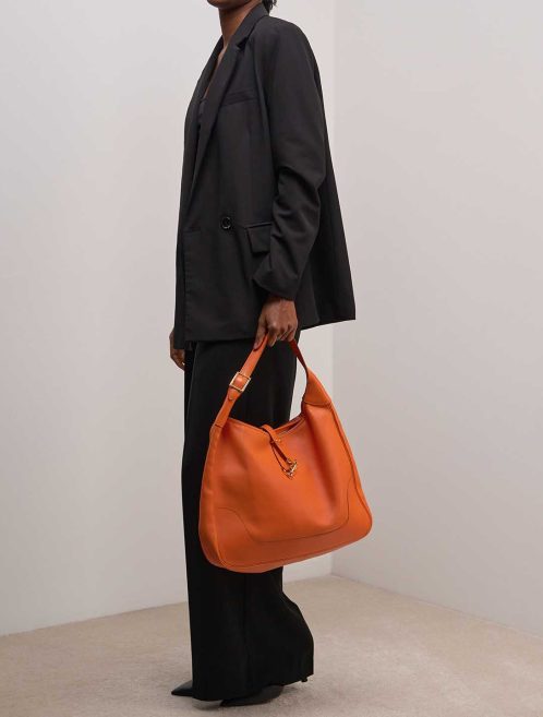 Hermès Trim 38 Gulliver Orange on Model | Sell your designer bag