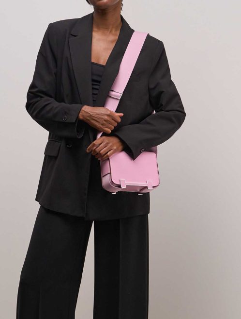 Hermès Geta Chèvre Mauve Sylvestre on Model | Sell your designer bag