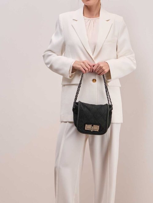Chanel Flap Bag Lamb / Shearling Black on Model | Sell your designer bag