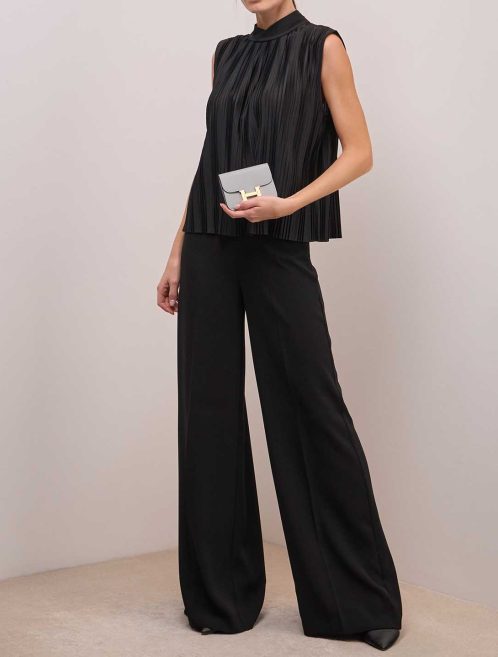 Hermès Constance Slim Wallet Evercolor Bleu Glacier on Model | Sell your designer bag