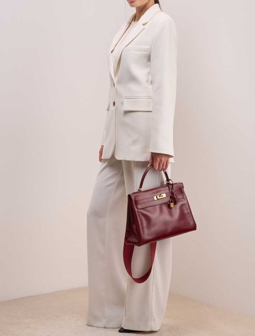 Hermès Kelly 32 Box Rouge H on Model | Sell your designer bag