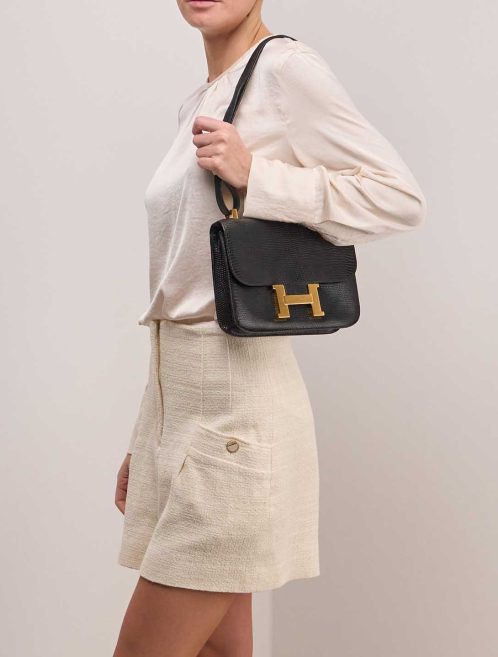 Hermès Constance 24 Lizard Black on Model | Sell your designer bag