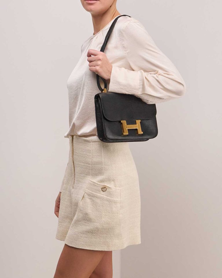 Hermès Constance 24 Lizard Black on Model | Sell your designer bag