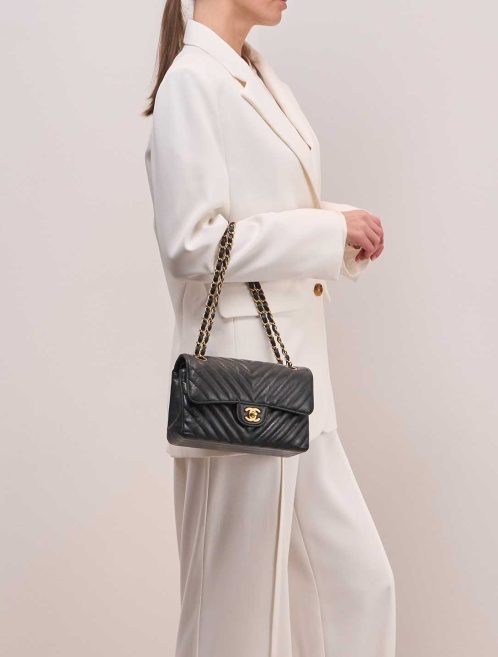 Chanel Timeless Medium Calf Dark Grey on Model | Sell your designer bag