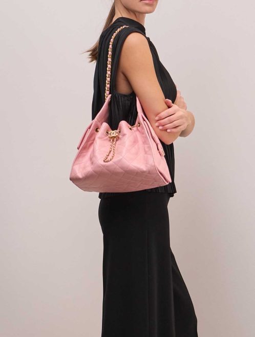 Chanel 25 Small Caviar Rose on Model | Sell your designer bag