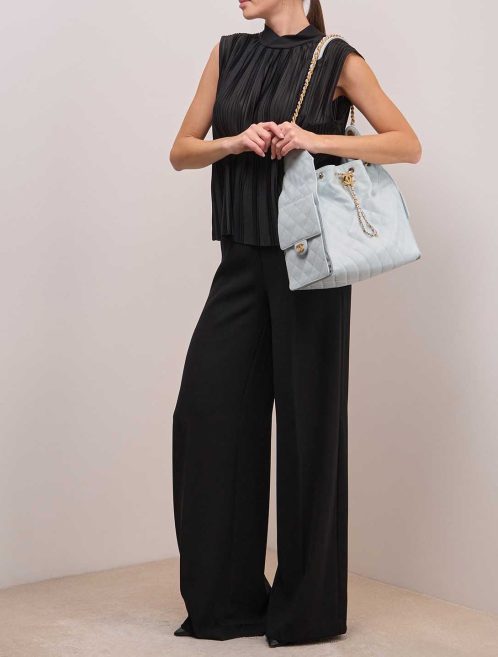 Chanel 25 Small Caviar Light Blue on Model | Sell your designer bag