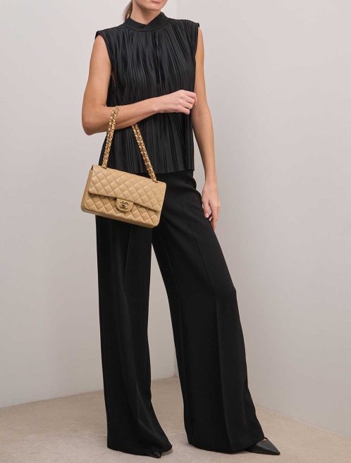 Chanel Timeless Medium Lamb Beige on Model | Sell your designer bag