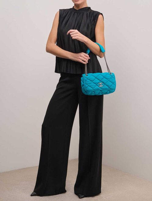 Chanel Flap Bag Medium Jersey Turquoise on Model | Sell your designer bag