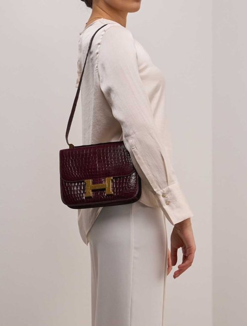 Hermès Constance 24 Crocodile Rouge H on Model | Sell your designer bag
