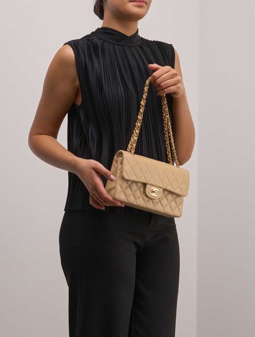 Chanel Timeless Small Lamb Beige on Model | Sell your designer bag