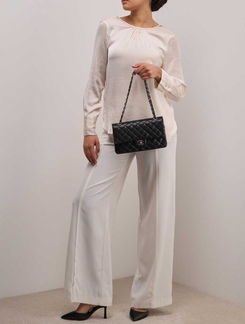Chanel Timeless Medium Lamb Black on Model | Sell your designer bag