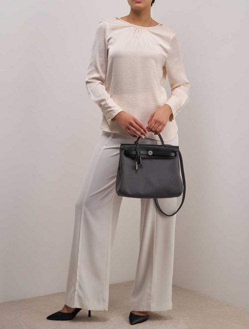 Hermès Herbag 31 Toile / Vache Hunter Black / Ardoise on Model | Sell your designer bag
