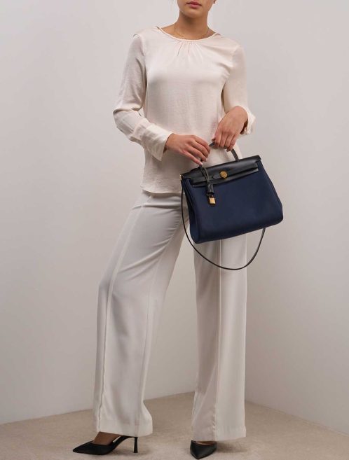 Hermès Herbag 31 Toile / Vache Hunter Bleu Marine / Black on Model | Sell your designer bag