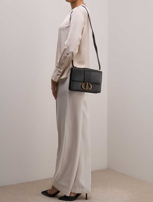 Dior 30 Montaigne Calf Black on Model | Sell your designer bag