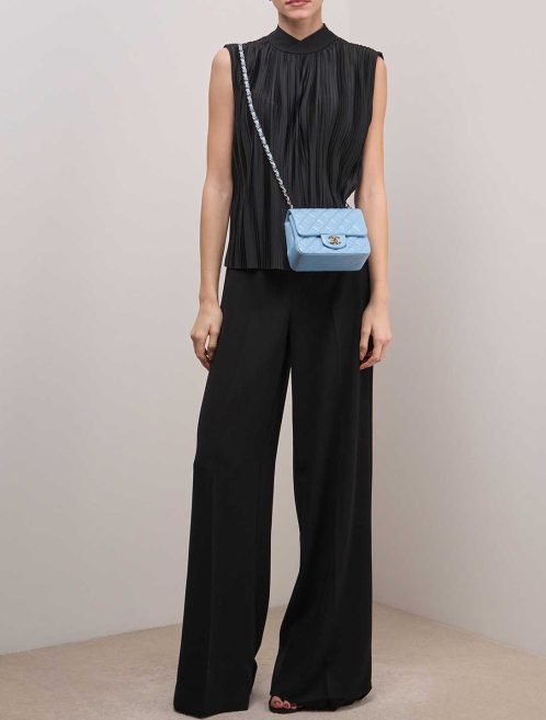 Chanel Timeless Mini Square Lamb Blue on Model | Sell your designer bag