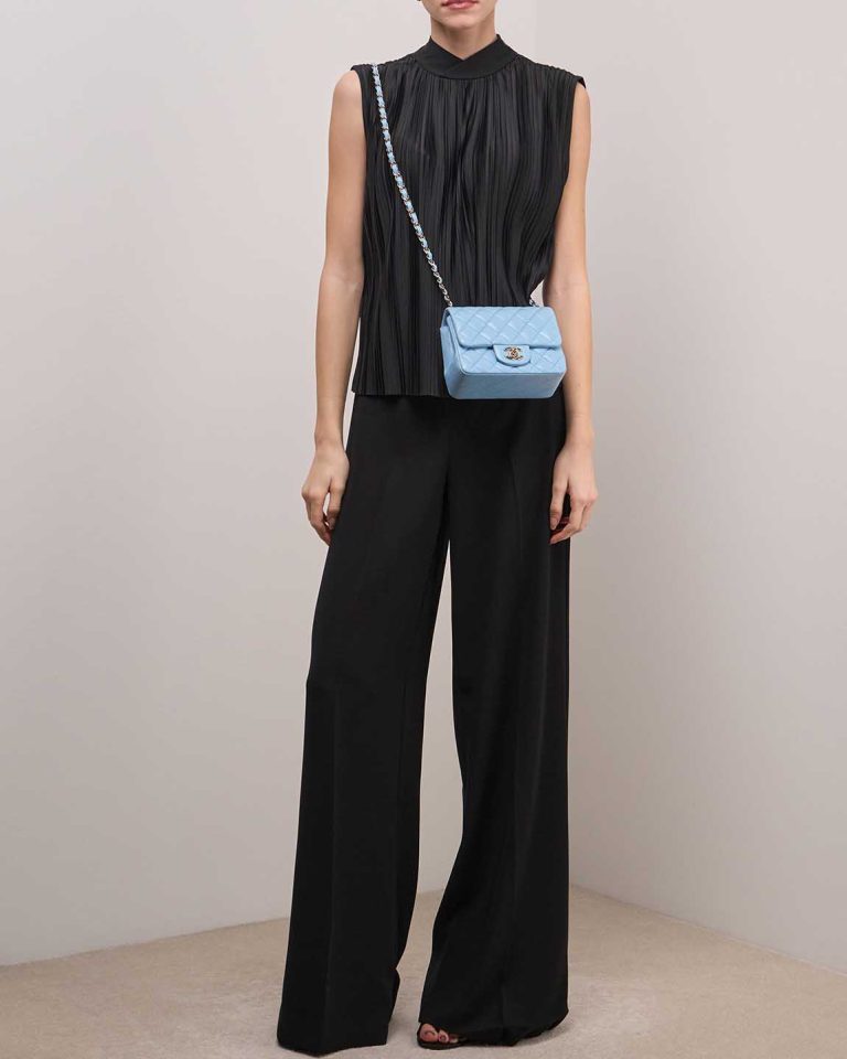Chanel Timeless Mini Square Lamb Blue on Model | Sell your designer bag