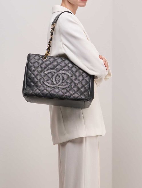 Chanel Shopping Tote GST Caviar Black on Model | Sell your designer bag