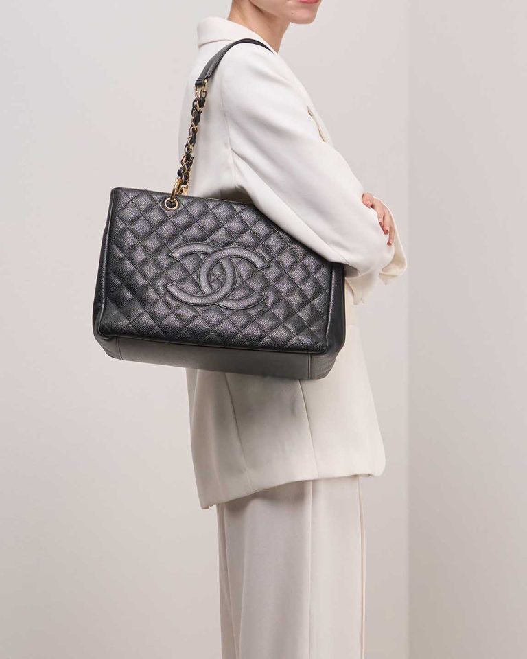 Chanel Shopping Tote GST Caviar Black on Model | Sell your designer bag
