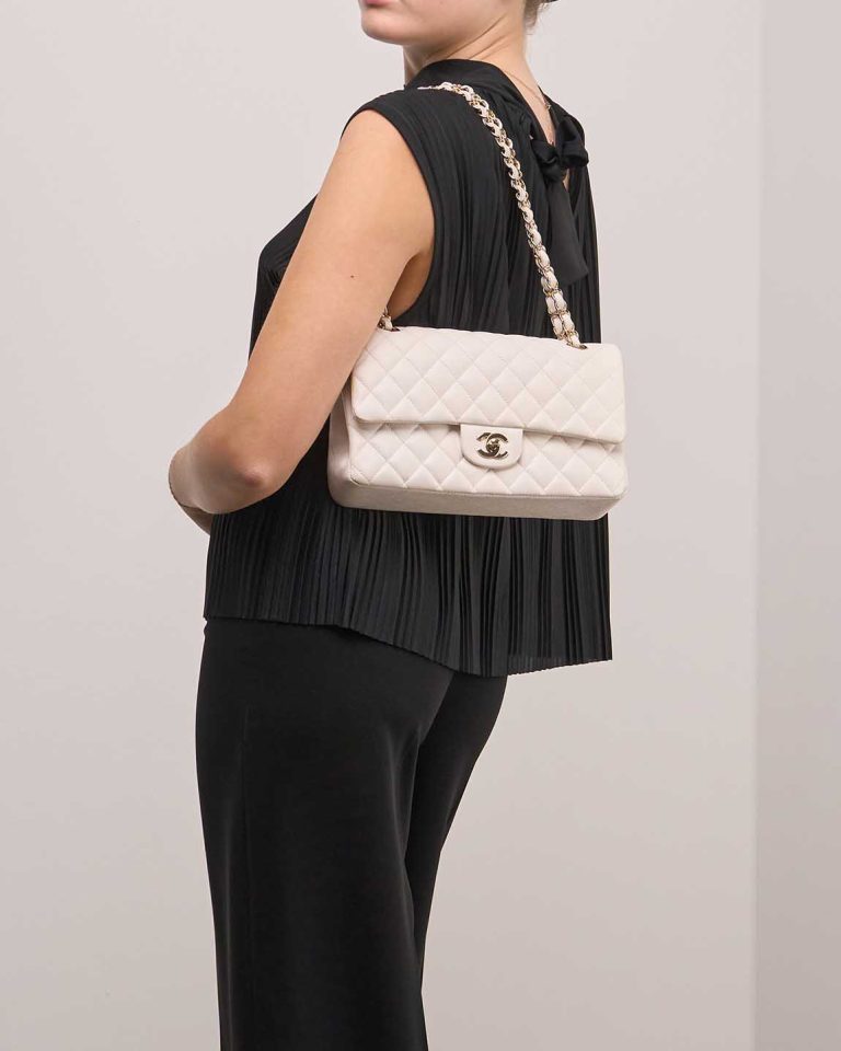 Chanel Timeless Medium Caviar White on Model | Sell your designer bag
