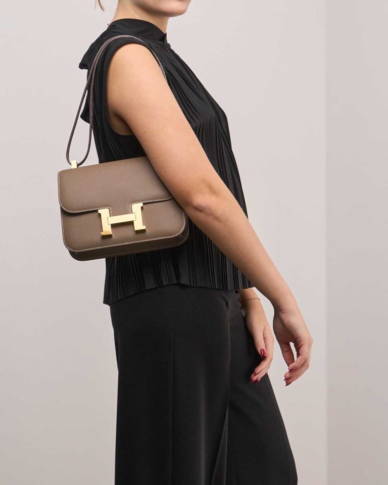 Hermès Constance 24 Epsom Étoupe on Model | Sell your designer bag