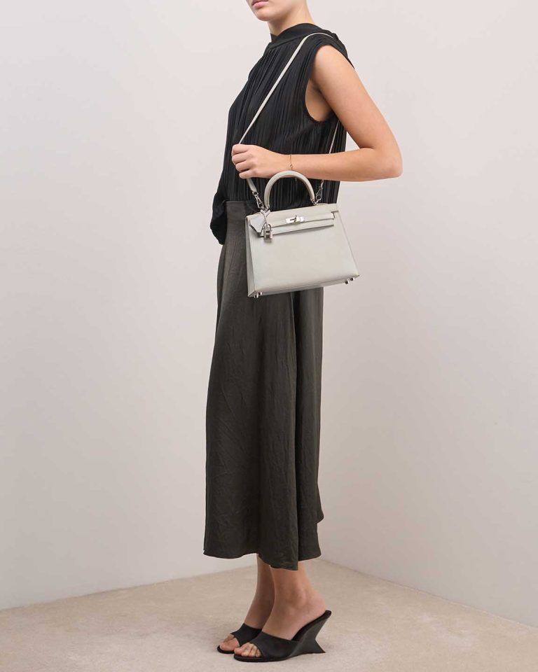Hermès Kelly 25 Swift Bleu Glacier on Model | Sell your designer bag