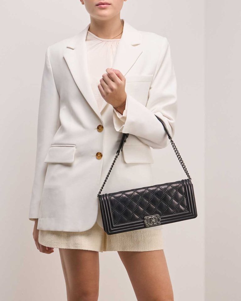 Chanel Boy Baguette Shoulder Bag Calf Black on Model | Sell your designer bag