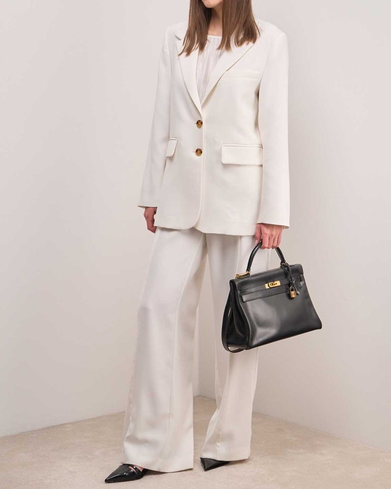 Hermès Kelly 32 Box Black on Model | Sell your designer bag