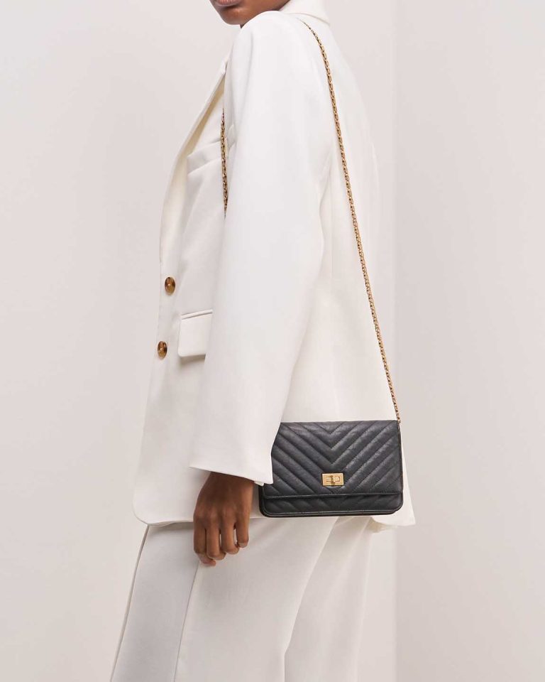 Chanel 2.55 Reissue Wallet On Chain Calf Black on Model | Sell your designer bag