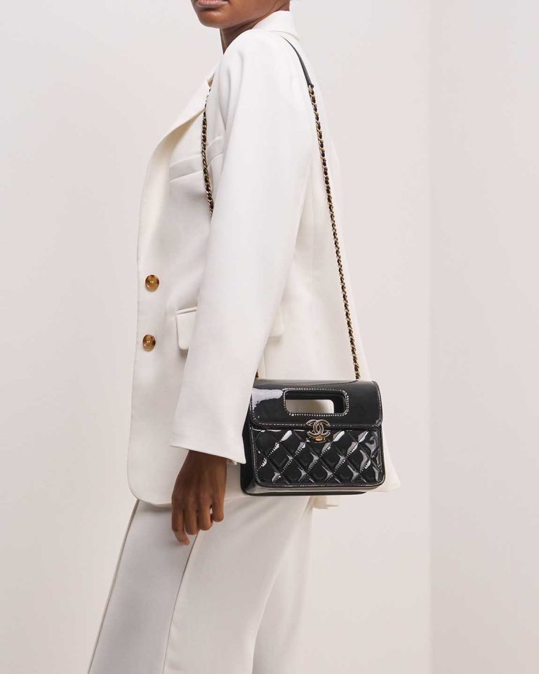 Chanel Timeless Small Patent Black on Model | Sell your designer bag