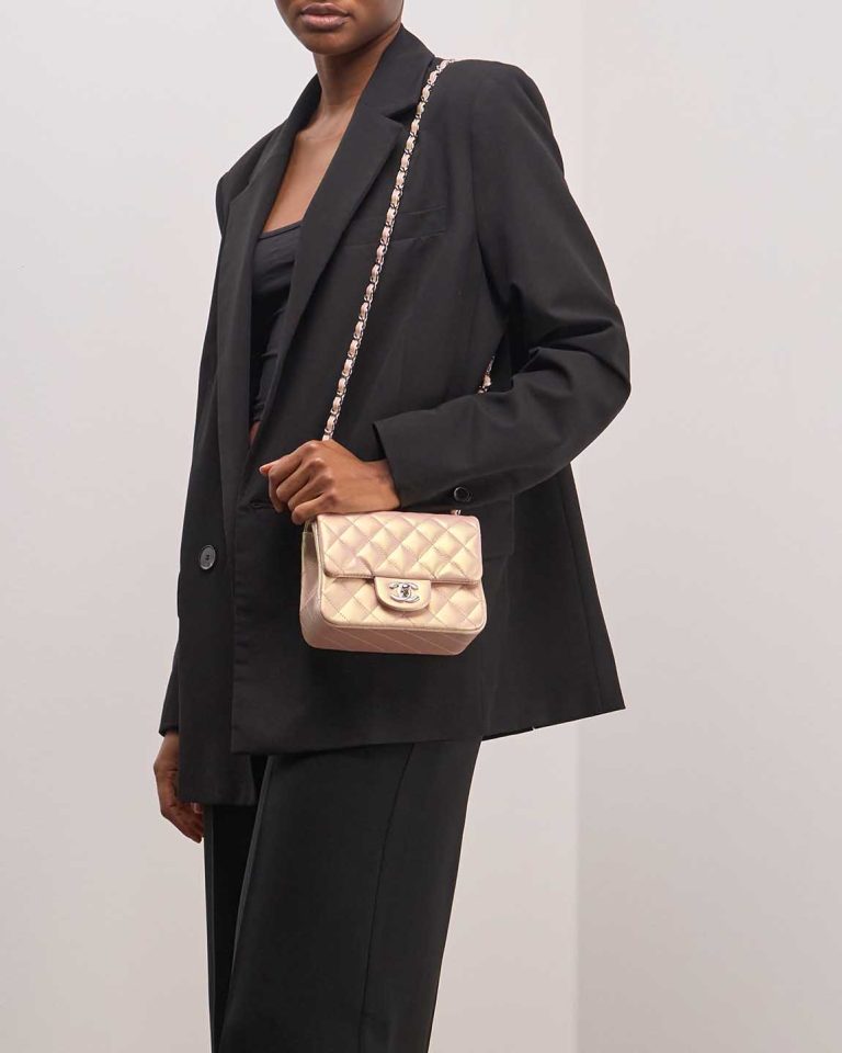 Chanel Timeless Mini Square Lamb Iridescent / Pink on Model | Sell your designer bag