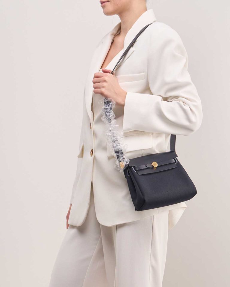 Hermès Herbag Mini Vache Hunter / Toile Bleu Indigo on Model | Sell your designer bag