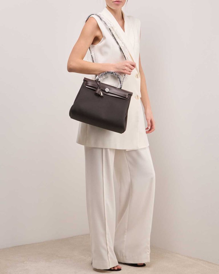 Hermès Herbag 31 Vache Hunter / Toile Ébène on Model | Sell your designer bag