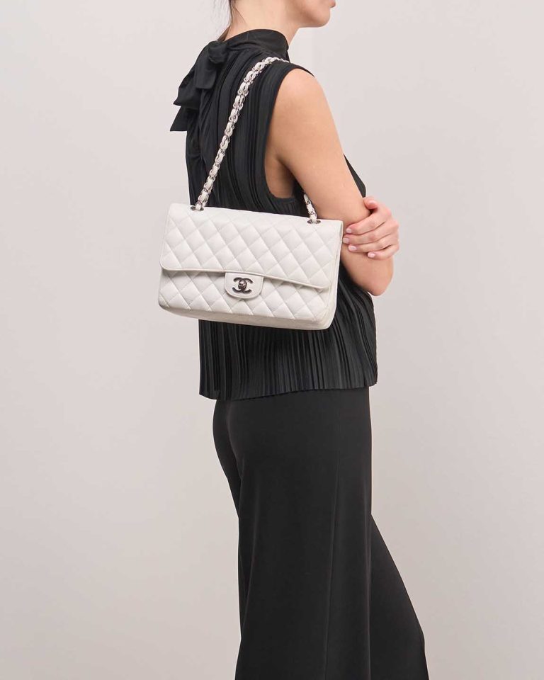 Chanel Timeless Medium Caviar White on Model | Sell your designer bag