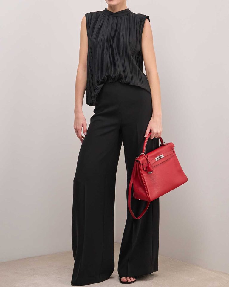 Hermès Kelly 32 Togo Rouge Casaque on Model | Sell your designer bag